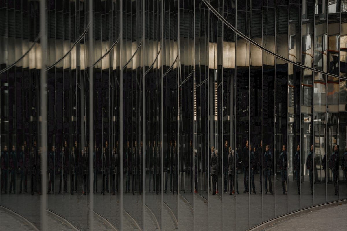 Light reflecting off a mirrored glass surface in an interior